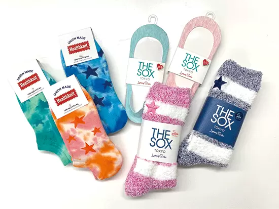 アメリカ発ブランド『ヘルスニット』や自社ブランド『THE SOX』などの商品展開を行っています。
