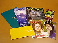 旅行情報誌や某大手メガネメーカーの冊子など、多彩な制作物