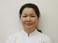 「患者さんの世話は大変ですが、充実した仕事です」患者さんとその家族からの信頼の厚い本多看護師長。